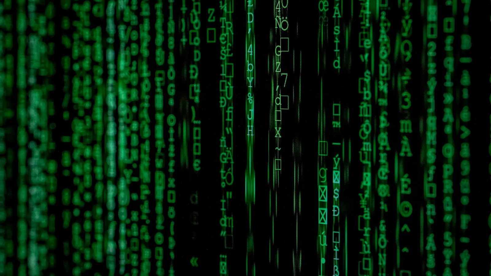 Columns of green binary digits on a dark screen