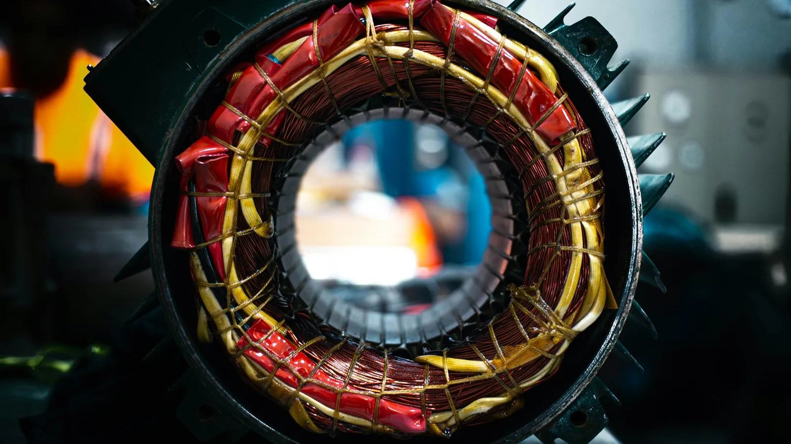 Copper wire windings inside the stator of an electric motor
