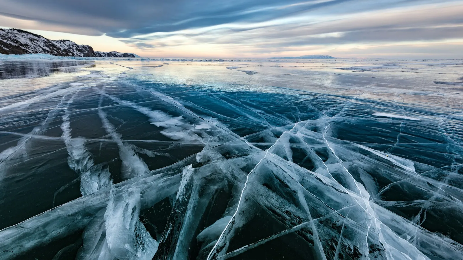 Cracked clear ice covering a frozen lake