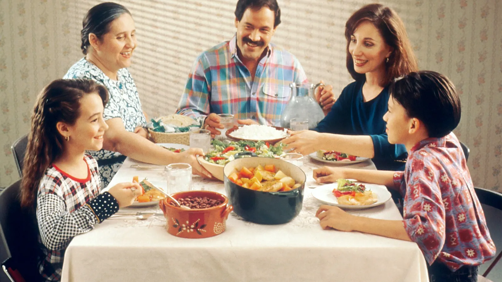 Family eating dinner together at home