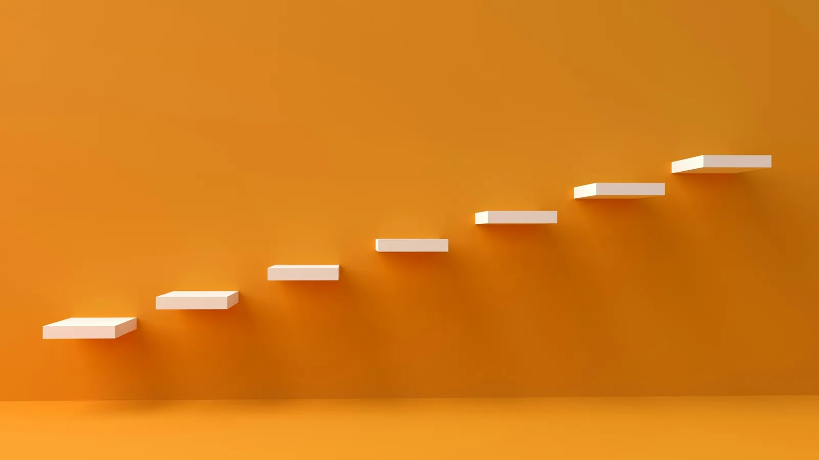 Floating white steps rising against an orange wall