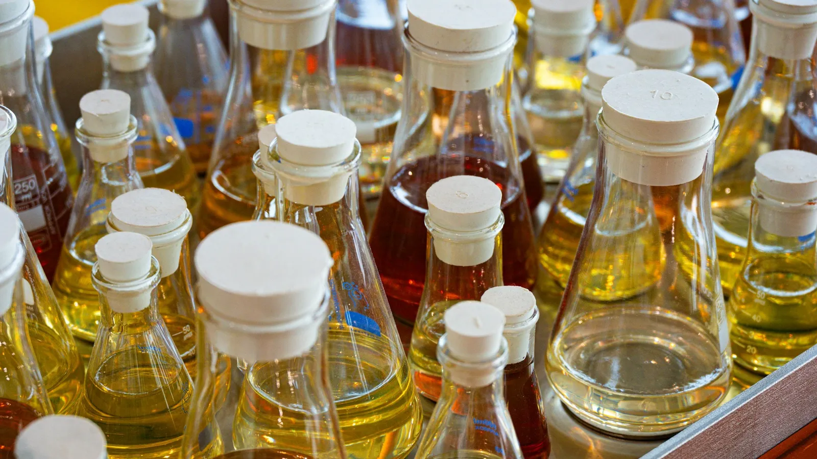 Glass bottles of yellow and clear liquids