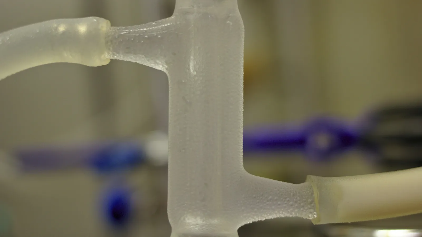 Glass tubing joined to a lab flask