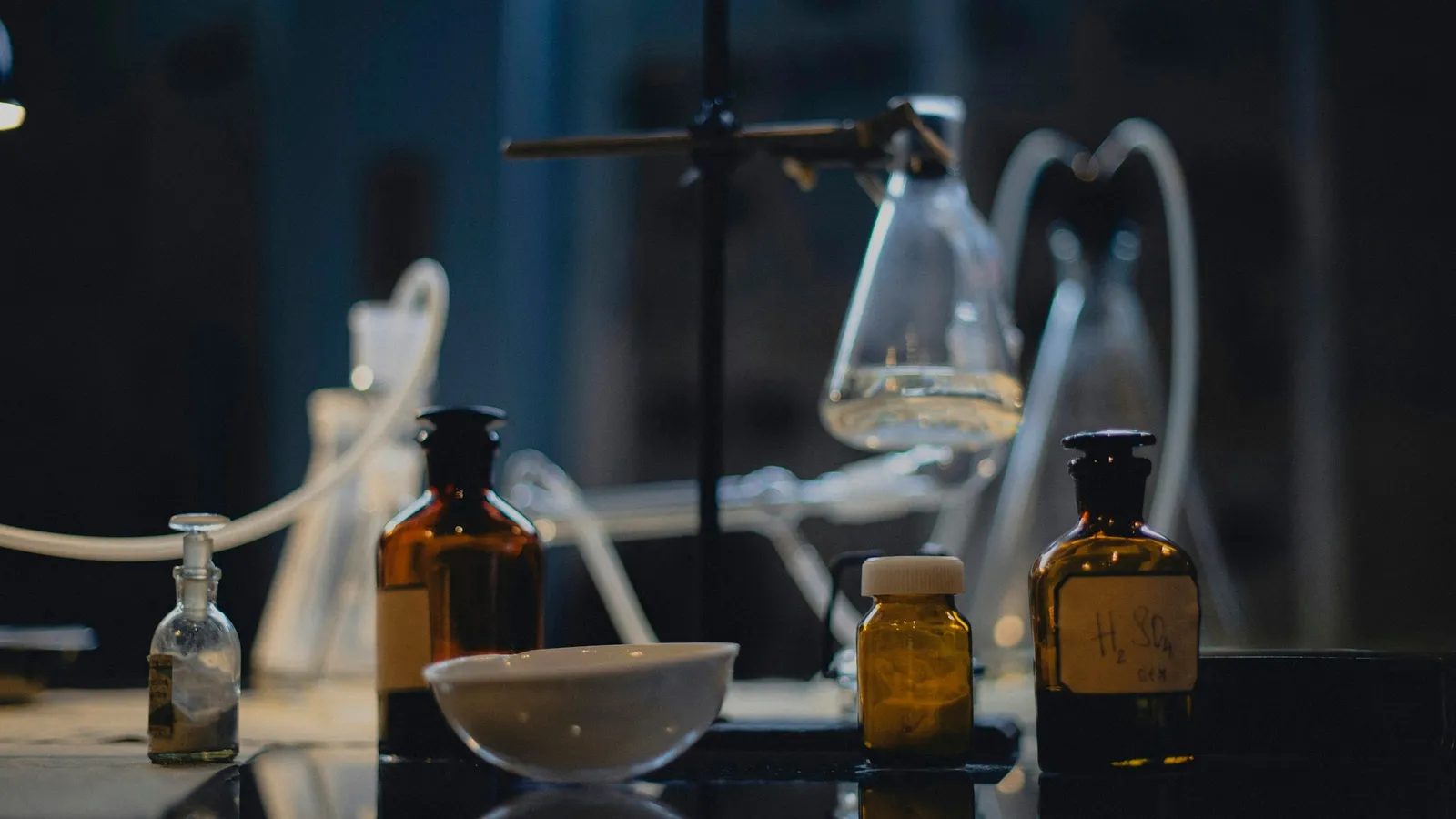 Glassware on a dimly lit laboratory bench
