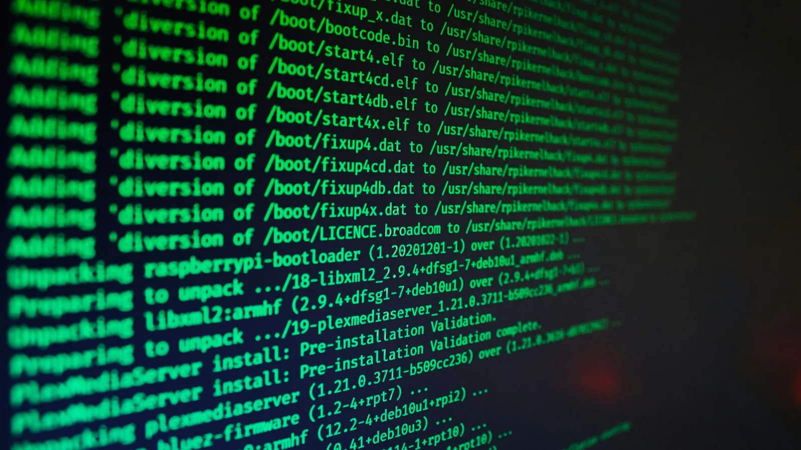 Green code text on a black terminal screen