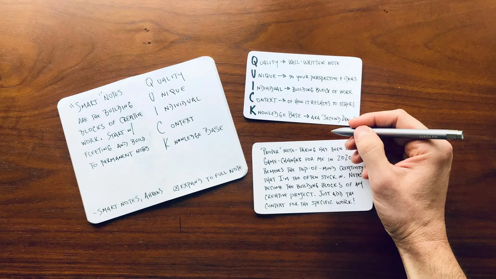 Hand writing on index cards