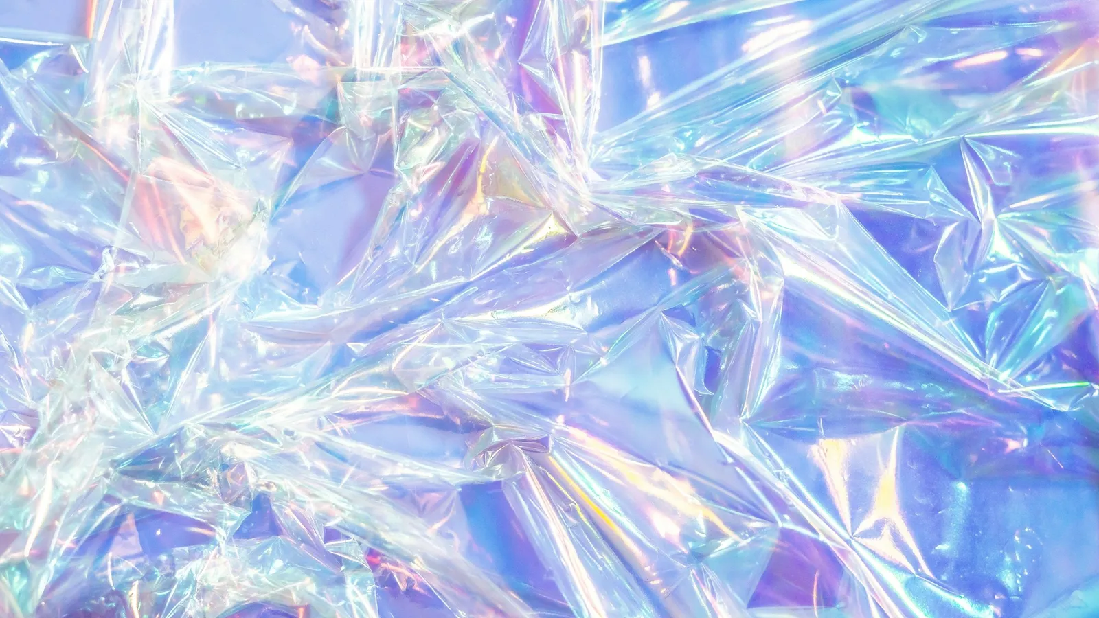 Iridescent holographic foil reflecting rainbow colours