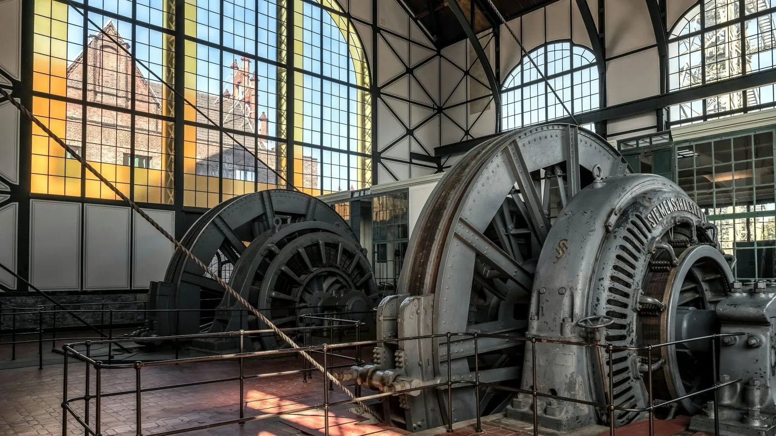 Large old generators in a power station hall