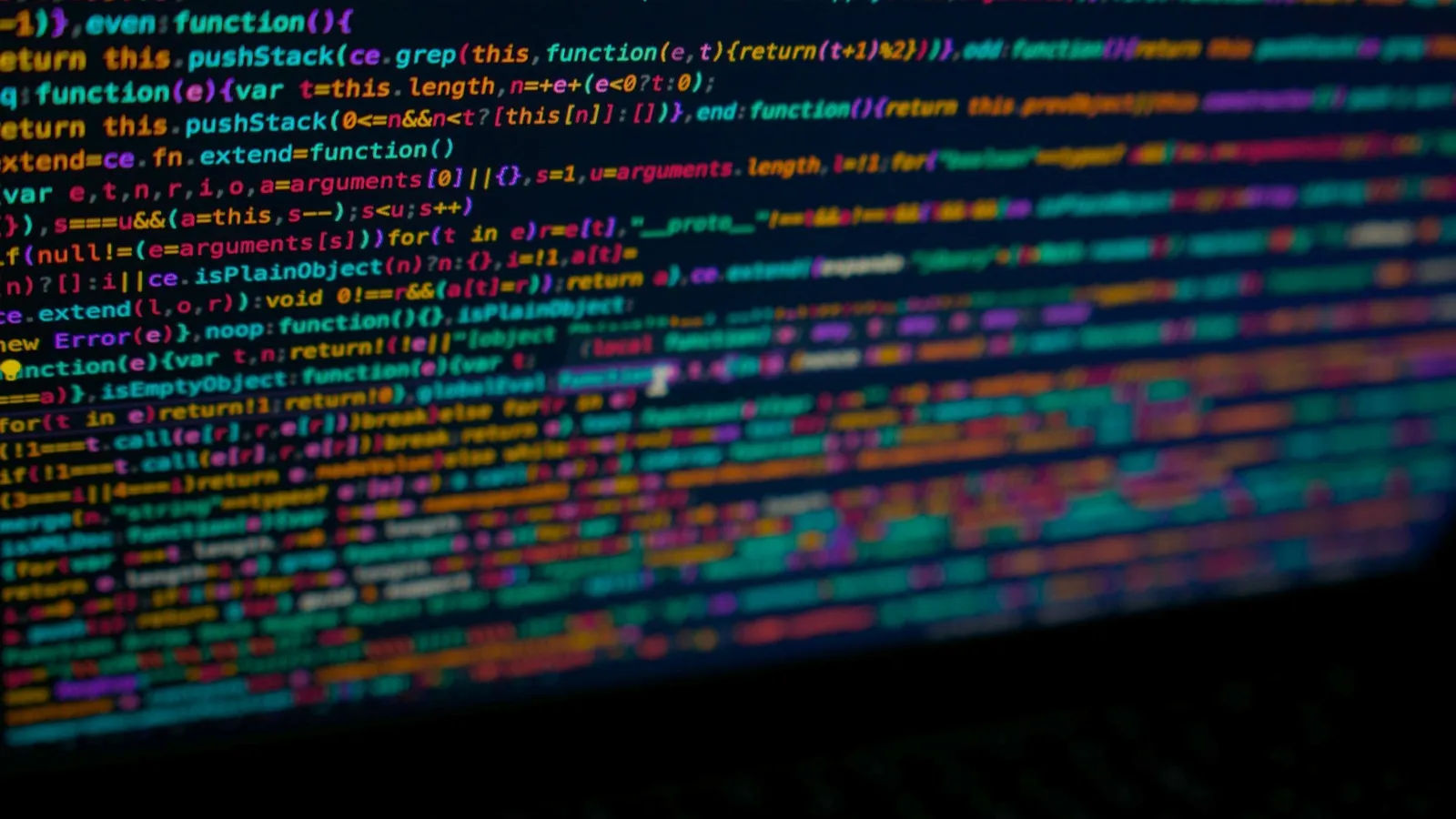 Lines of colourful code on a dark screen