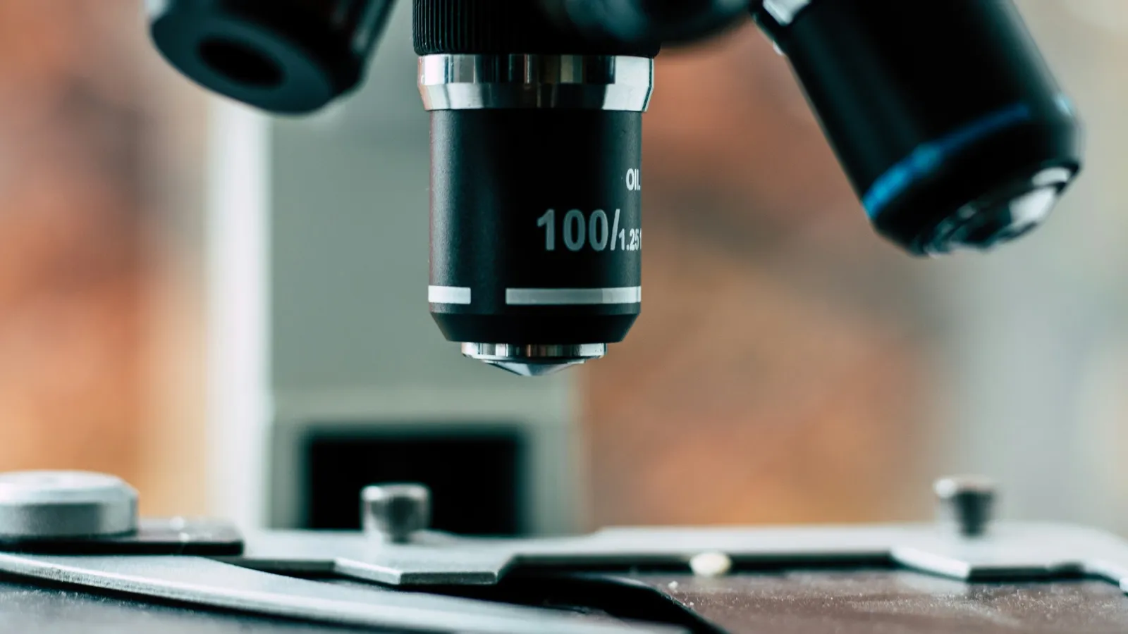 Microscope objective lenses above a glass slide