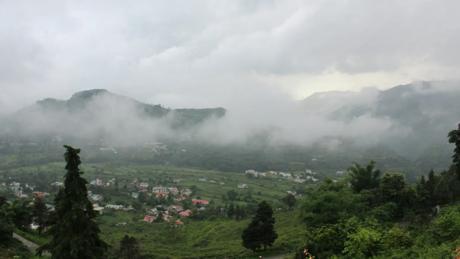 Monsoon mist and cloud over green Indian hills