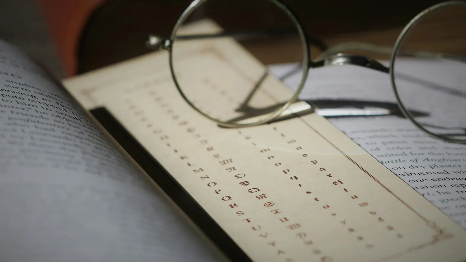 Close-up of an old printed page with columns of letters