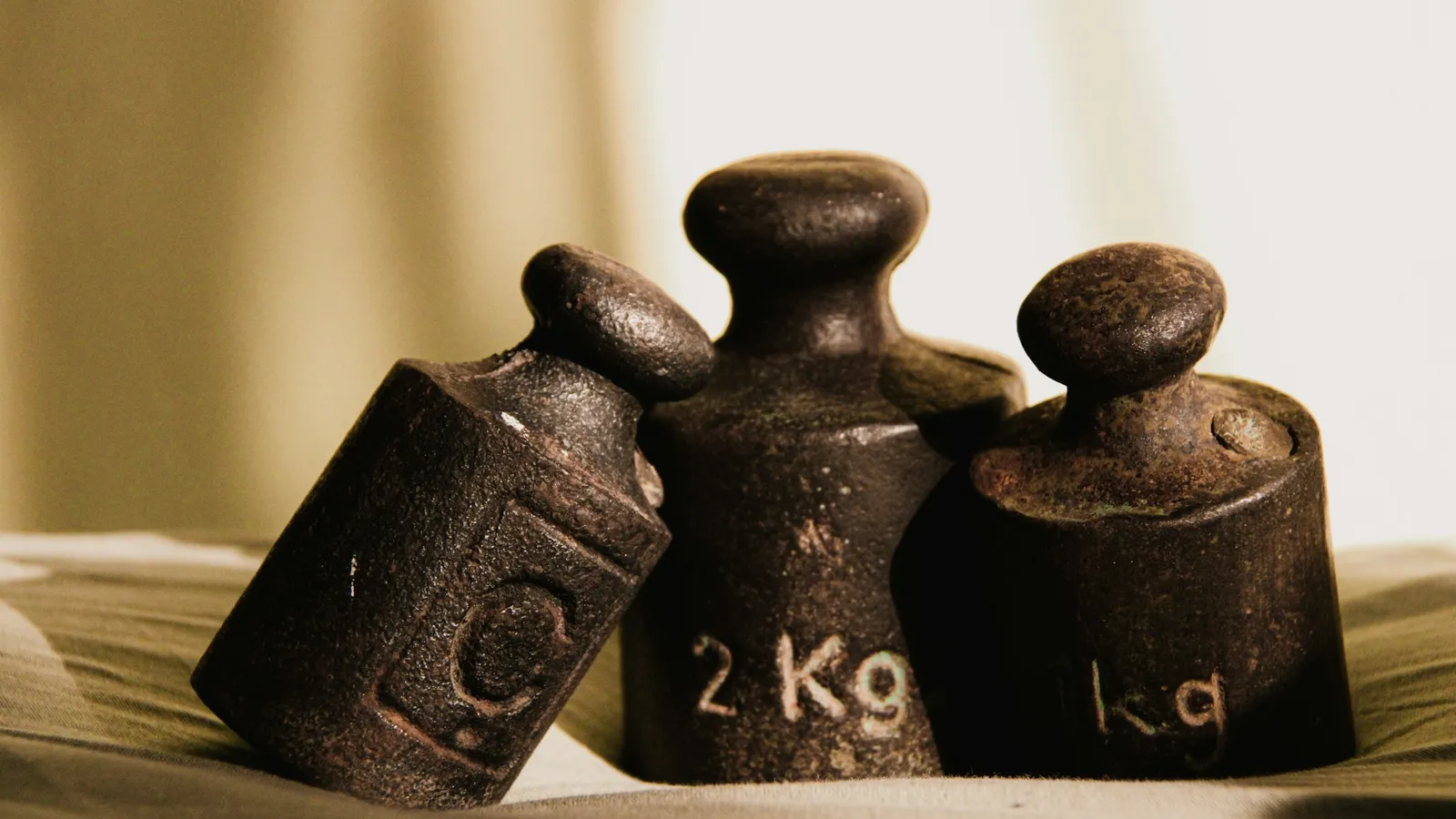 Old iron weights stamped in kilograms