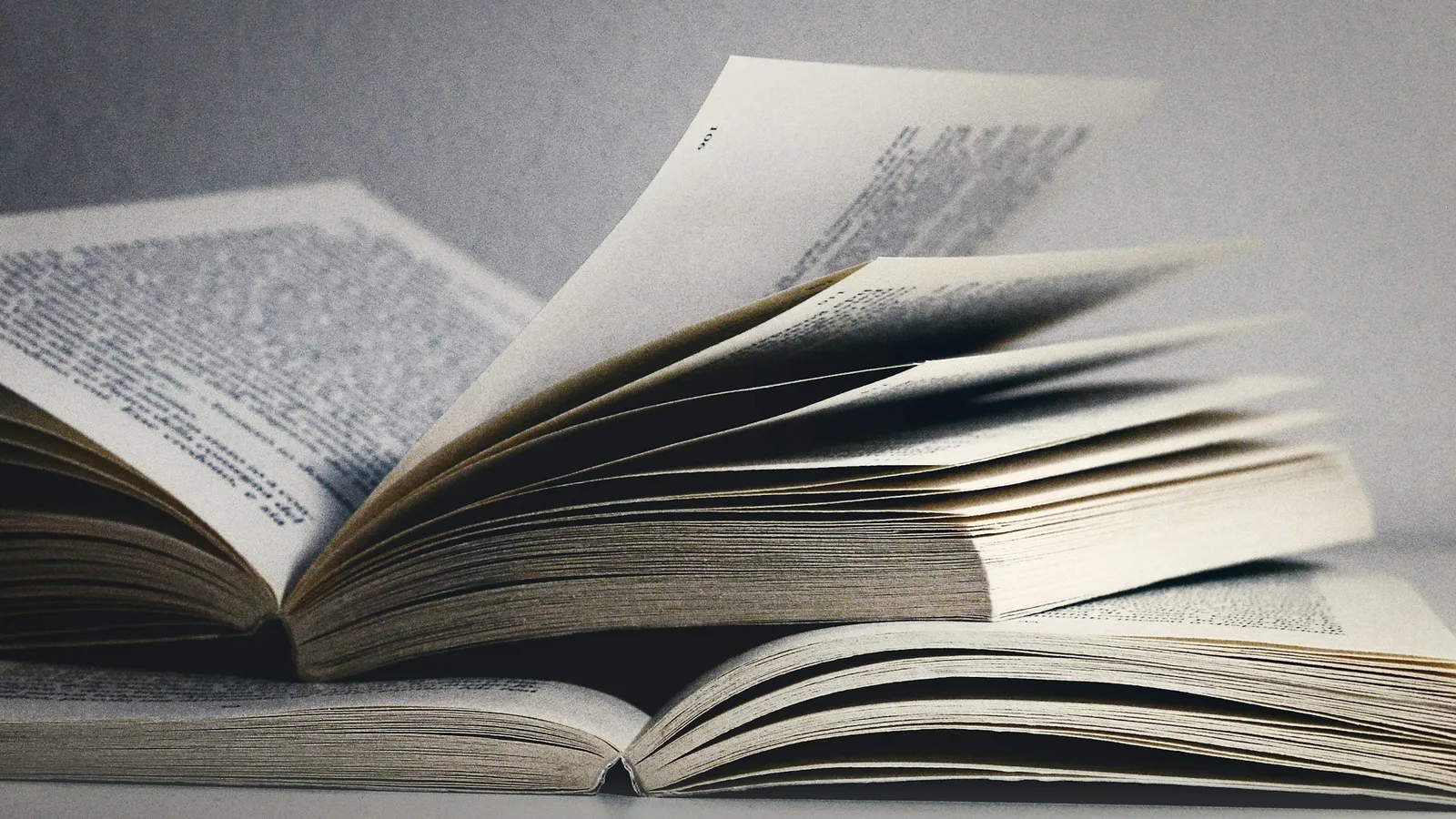 Open paperback book with its pages fanned
