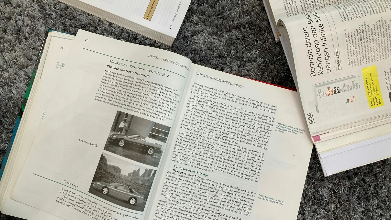 Open physics textbook with highlighted notes