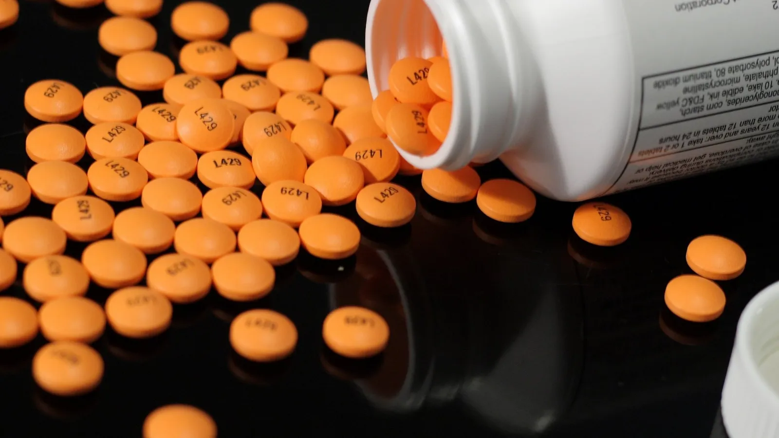 Orange generic regular strength enteric coated aspirin tablets