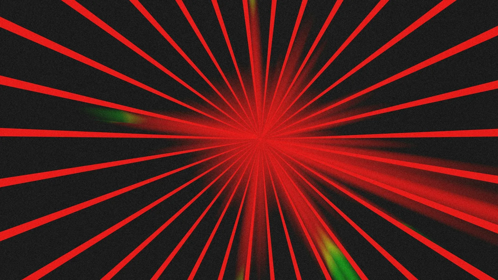 Red laser beams fanning out in the dark