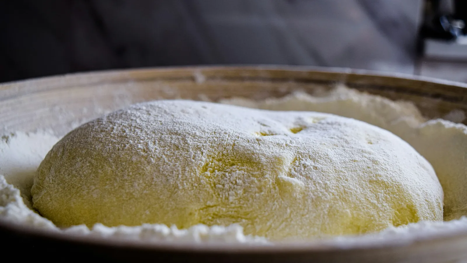 Risen bread dough in a bowl