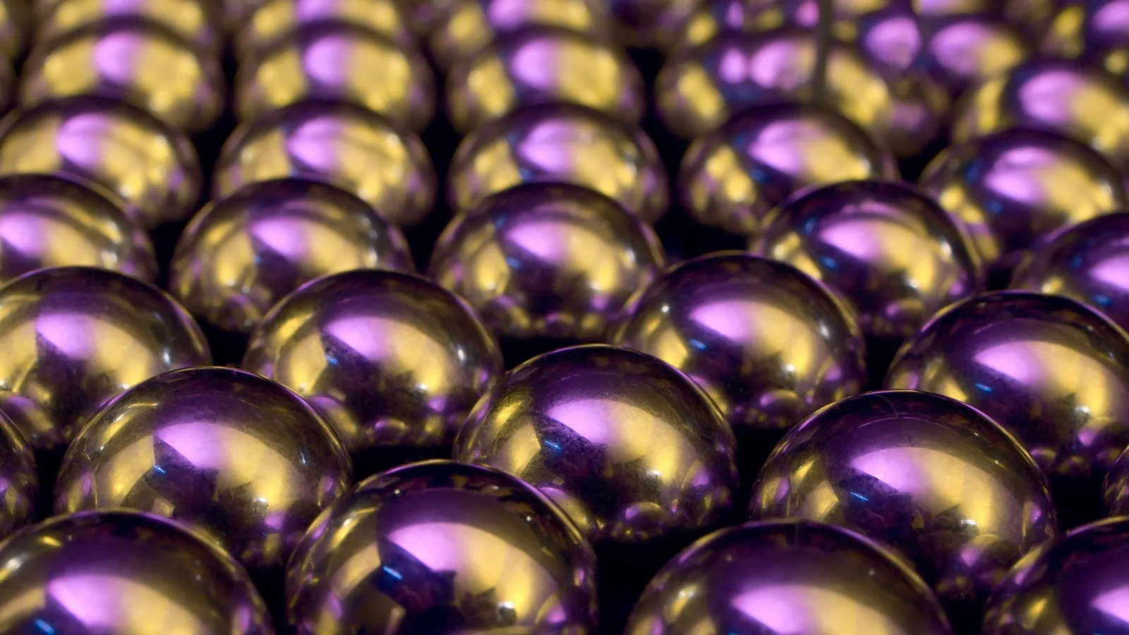 Rows of shiny metal spheres