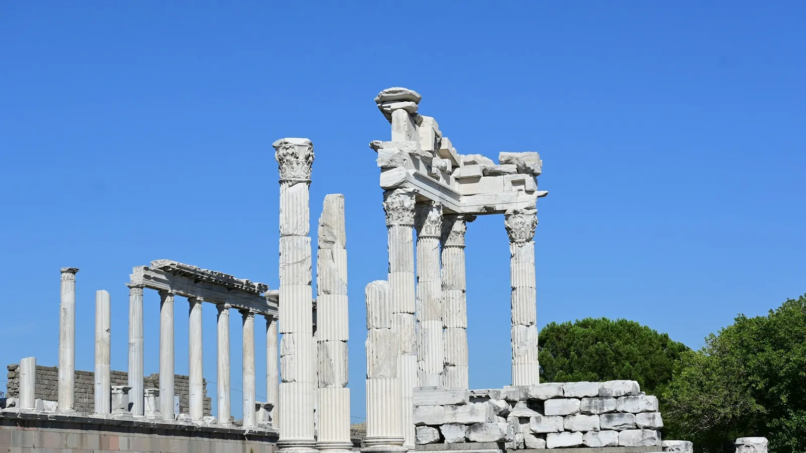 Ruined marble columns of an ancient temple on a hilltop