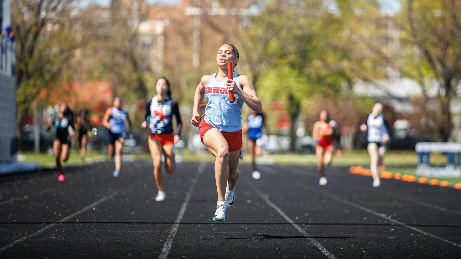 Runners racing on a track