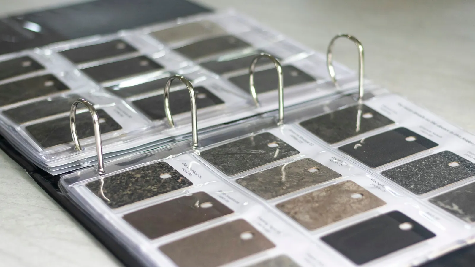 Samples of metals displayed in a clear specimen case