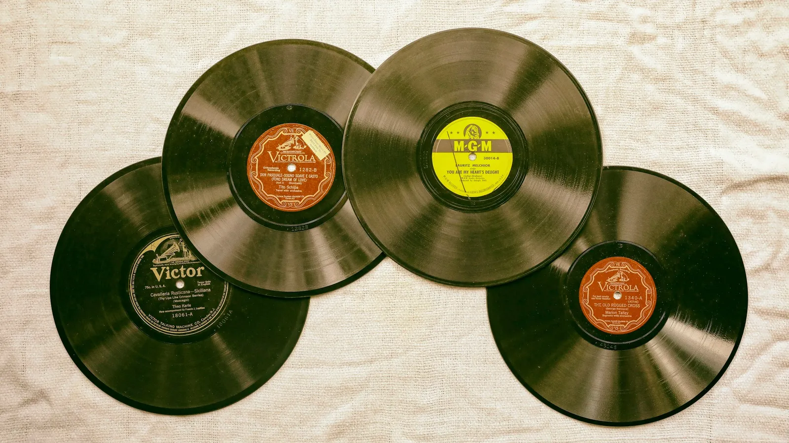 Several old gramophone records laid out together