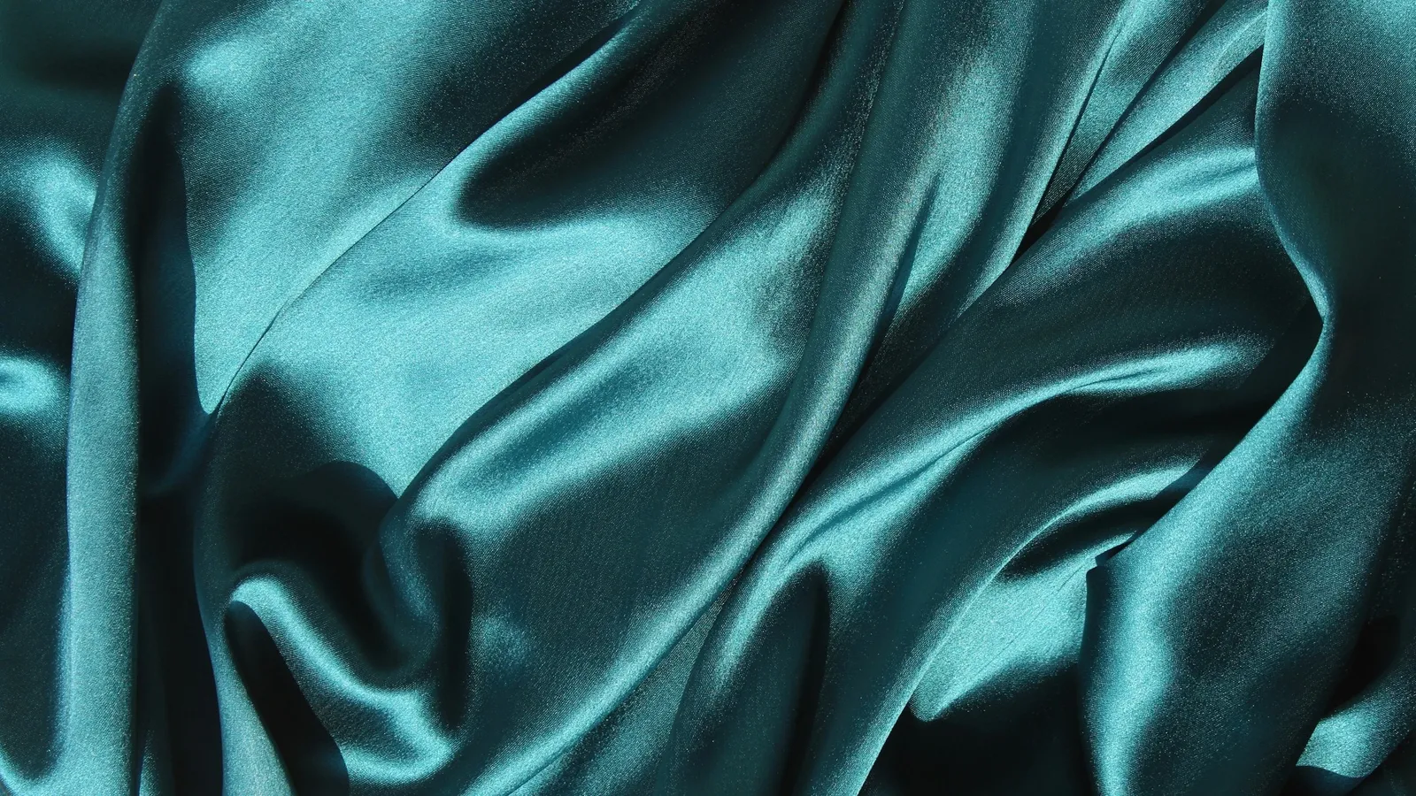 Shimmering teal silk fabric