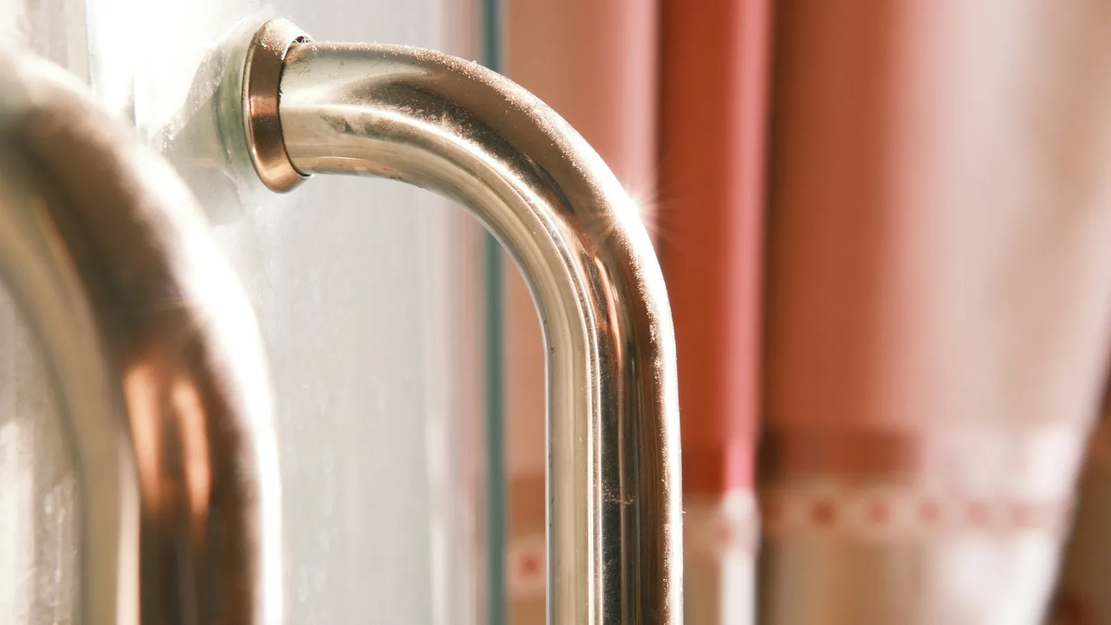 Shiny chrome-plated taps above a sink