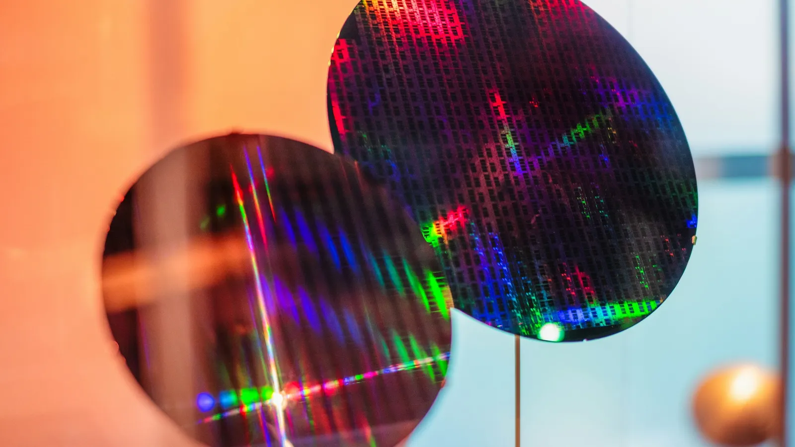 Silicon wafers with rainbow reflections from their chip patterns