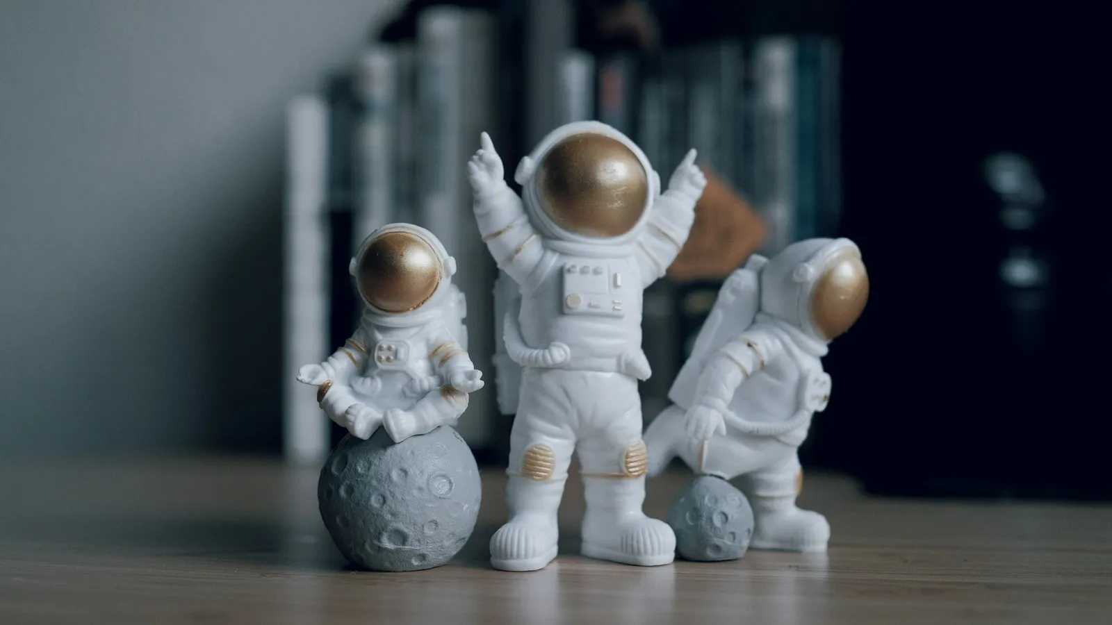 Small astronaut figurines on a table
