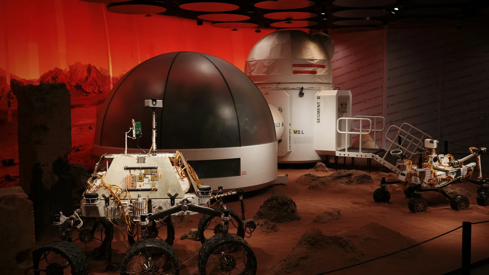 Space exhibits displayed in a science museum hall