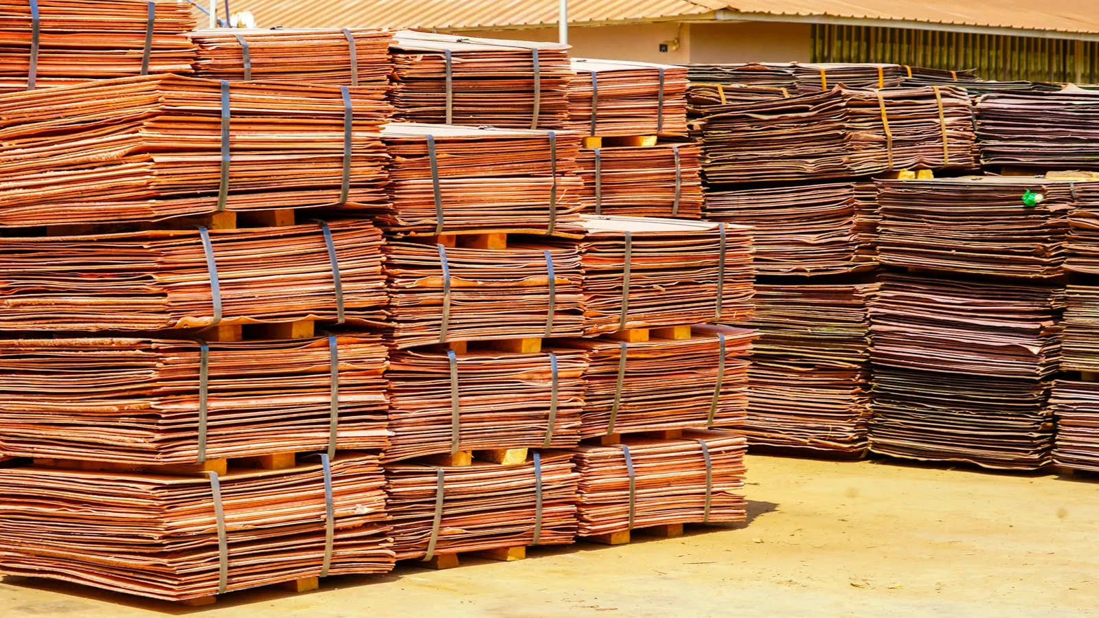 Stacks of copper sheets at a refinery