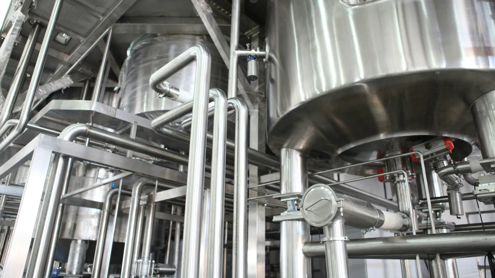 Stainless steel tanks and pipes in a processing plant