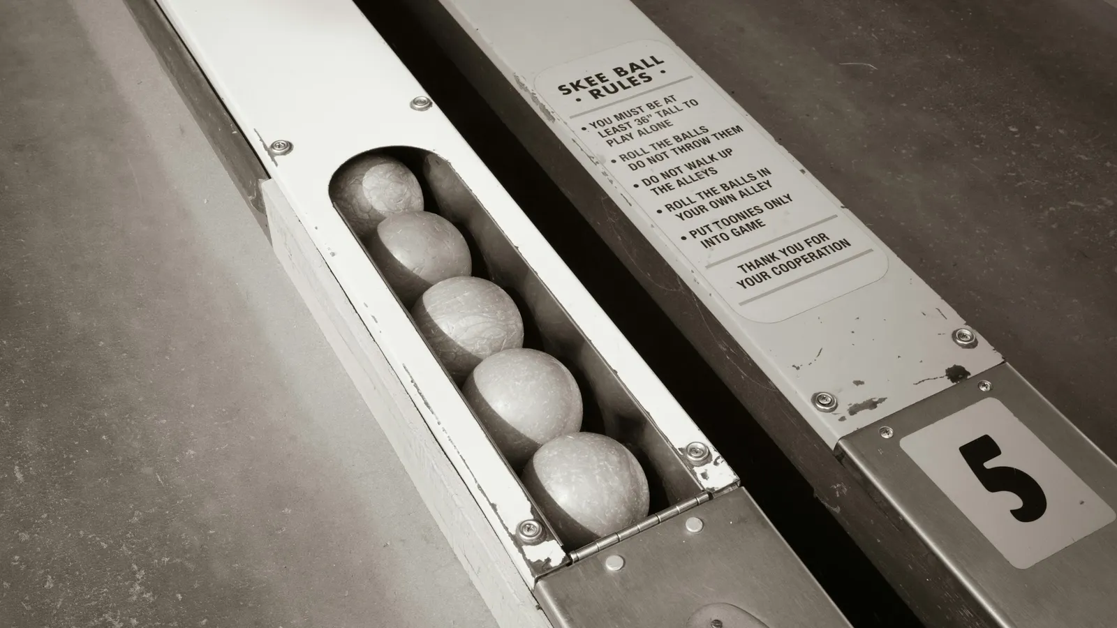 Steel balls lined up in a sloping track