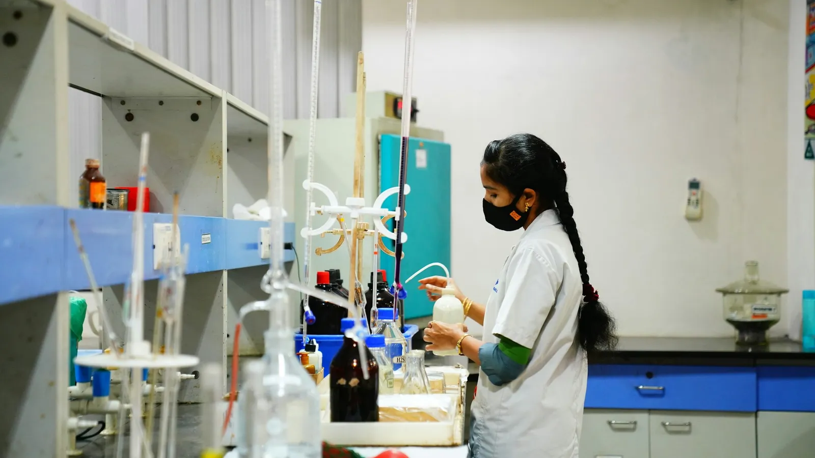 Student working at a school laboratory bench