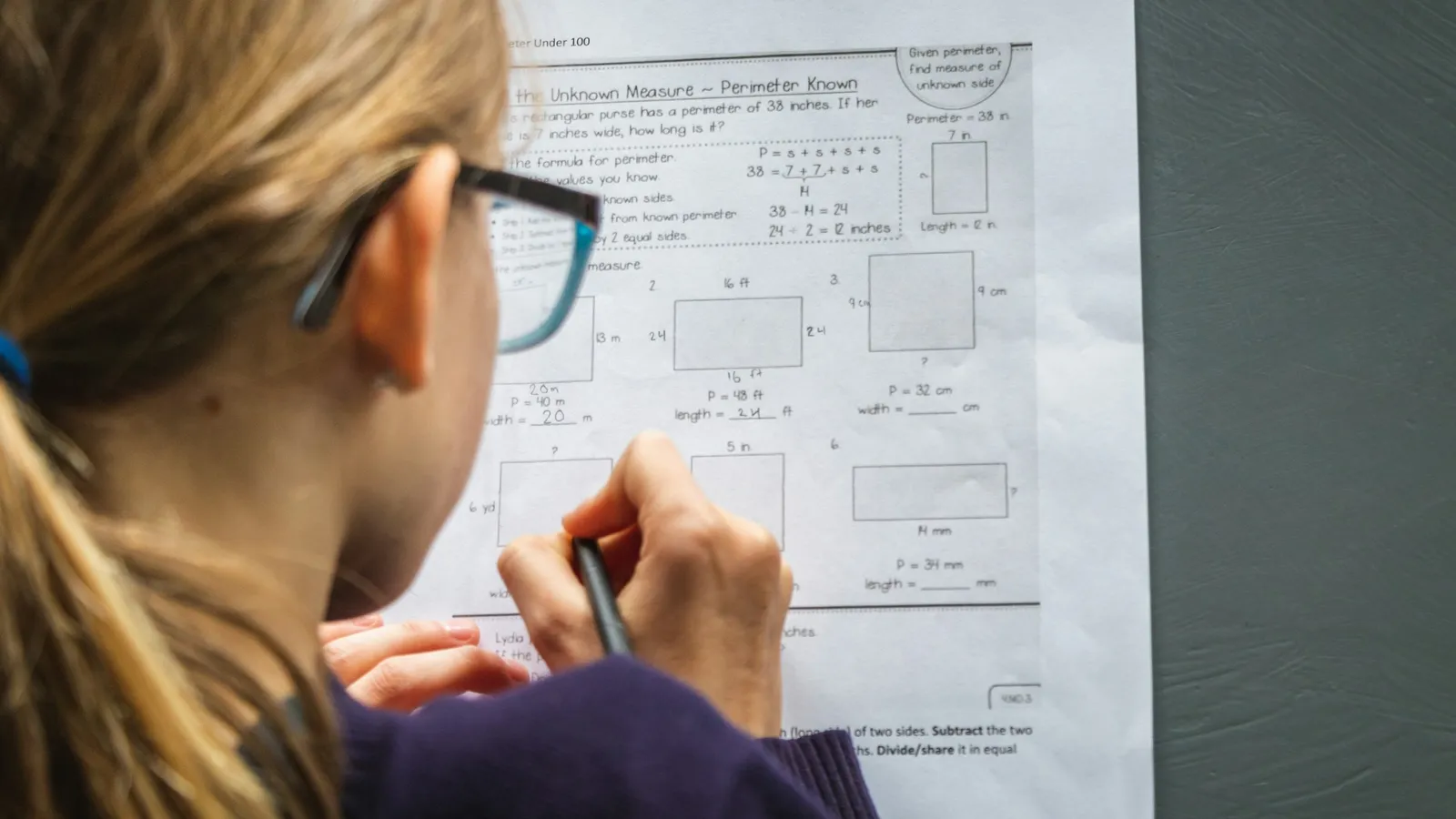 Student working through a worksheet