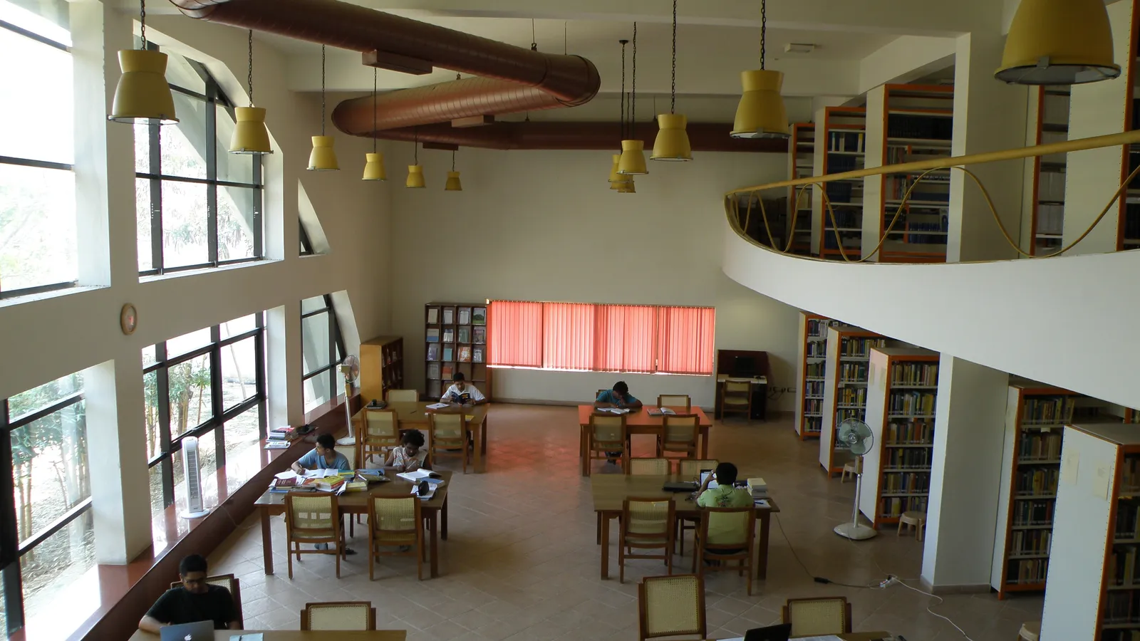 Students studying at tables in the Chennai Mathematical Institute library