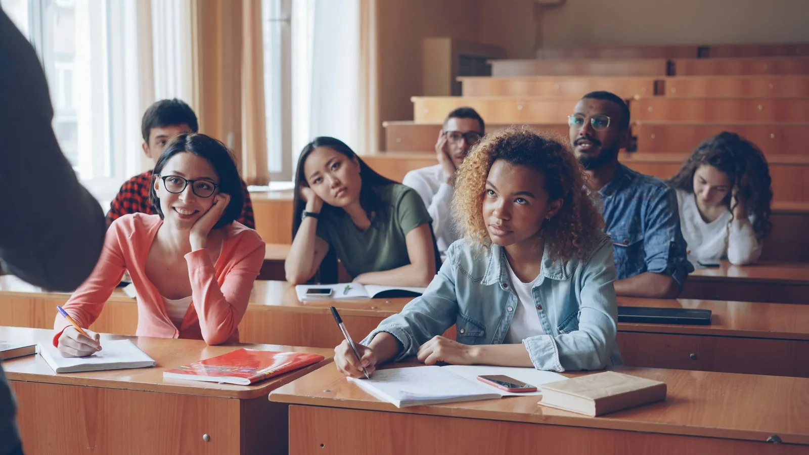 Students talking with each other during a lecture