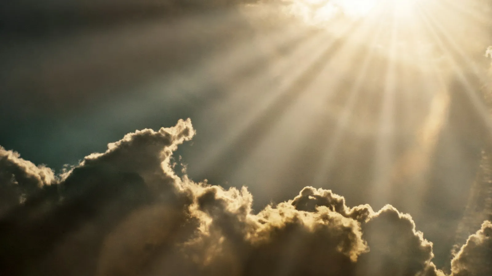 Sunbeams breaking through clouds