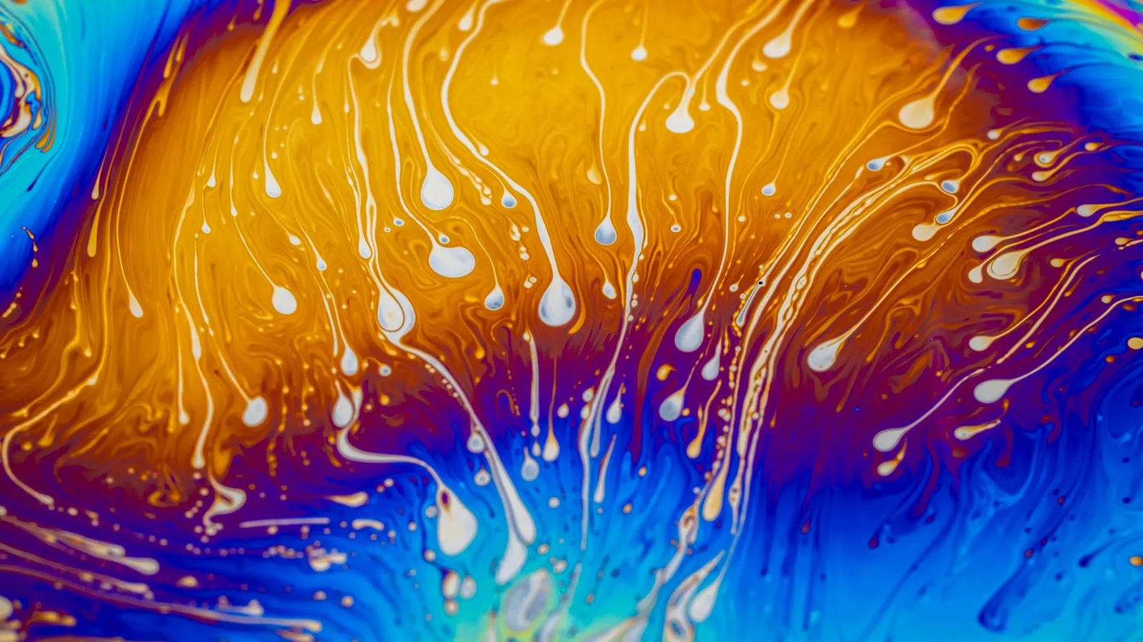 Swirling interference colours on a soap film