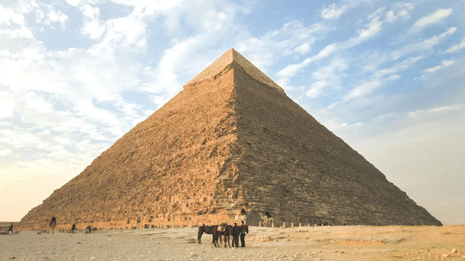 The Great Pyramid of Giza under a blue sky