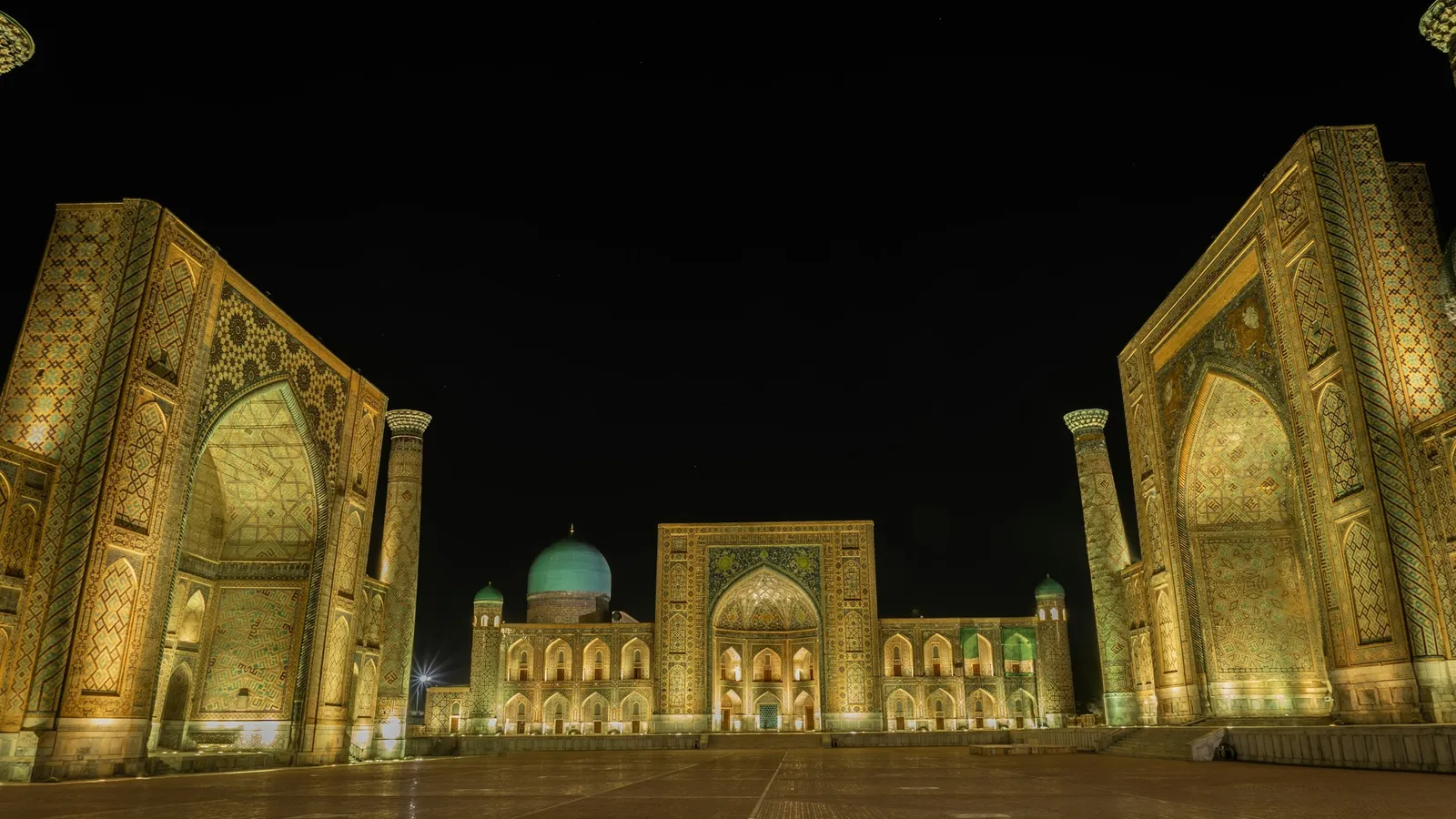 The Registan in Samarkand lit up at night