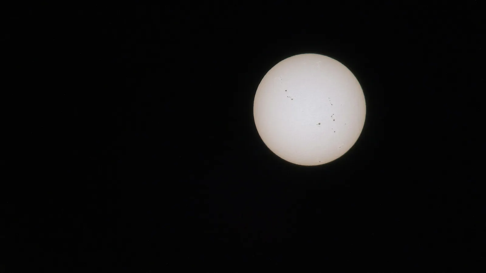 The Sun seen as a bright disc through a filter