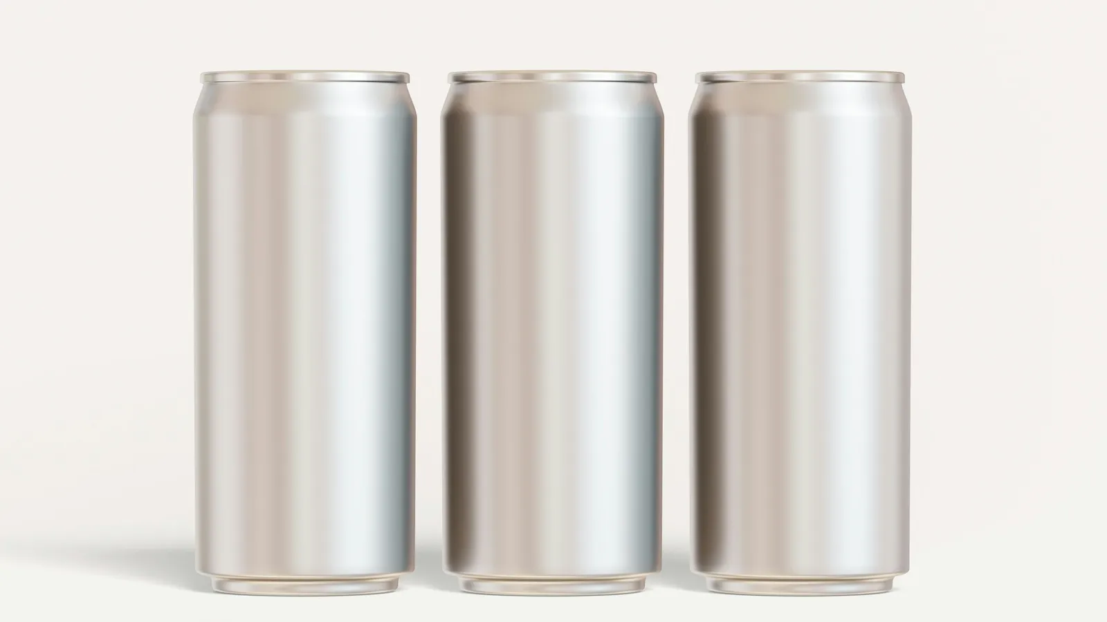 Three plain aluminium cans on a white background