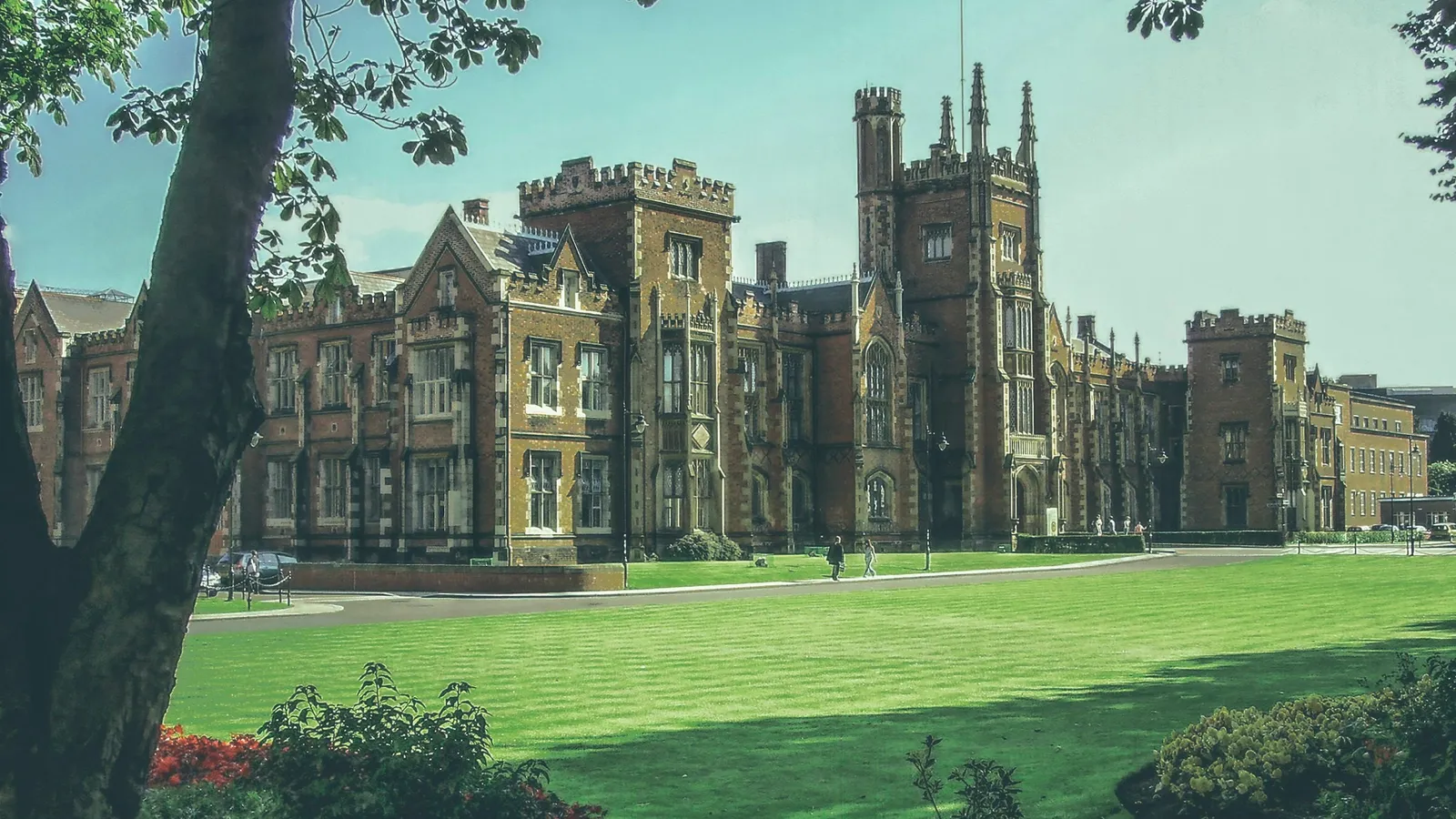 University building behind a green lawn