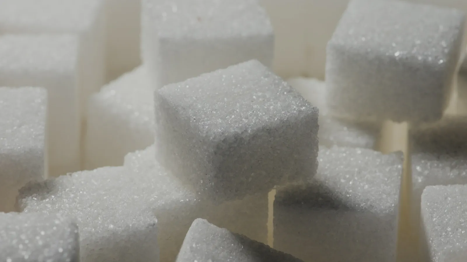 White sugar cubes stacked together