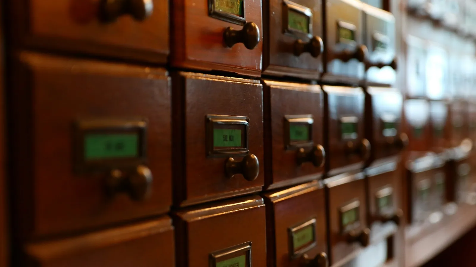 Wooden library card catalogue drawers